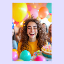 Load image into Gallery viewer, Woman with curly hair smiling at a birthday party with colorful balloons and a cake.
