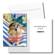 Load image into Gallery viewer, A congratulations greeting card. The front has a small chihuahua dog wearing sunglasses and text that reads, &quot;Cool. Confident. CRUSHING IT!&quot; The inside says, &quot;Some people dream it. You did it. CONGRATS!&quot; Includes a white envelope.

